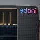 Markets climb on sharp rally in Adani group firms, fresh foreign fund inflows