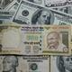 Rupee falls 14 paise to close at 86.59 against U.S. dollar